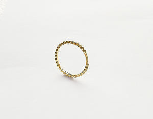 Product picture of Veritume ring in gold named Charlie.   